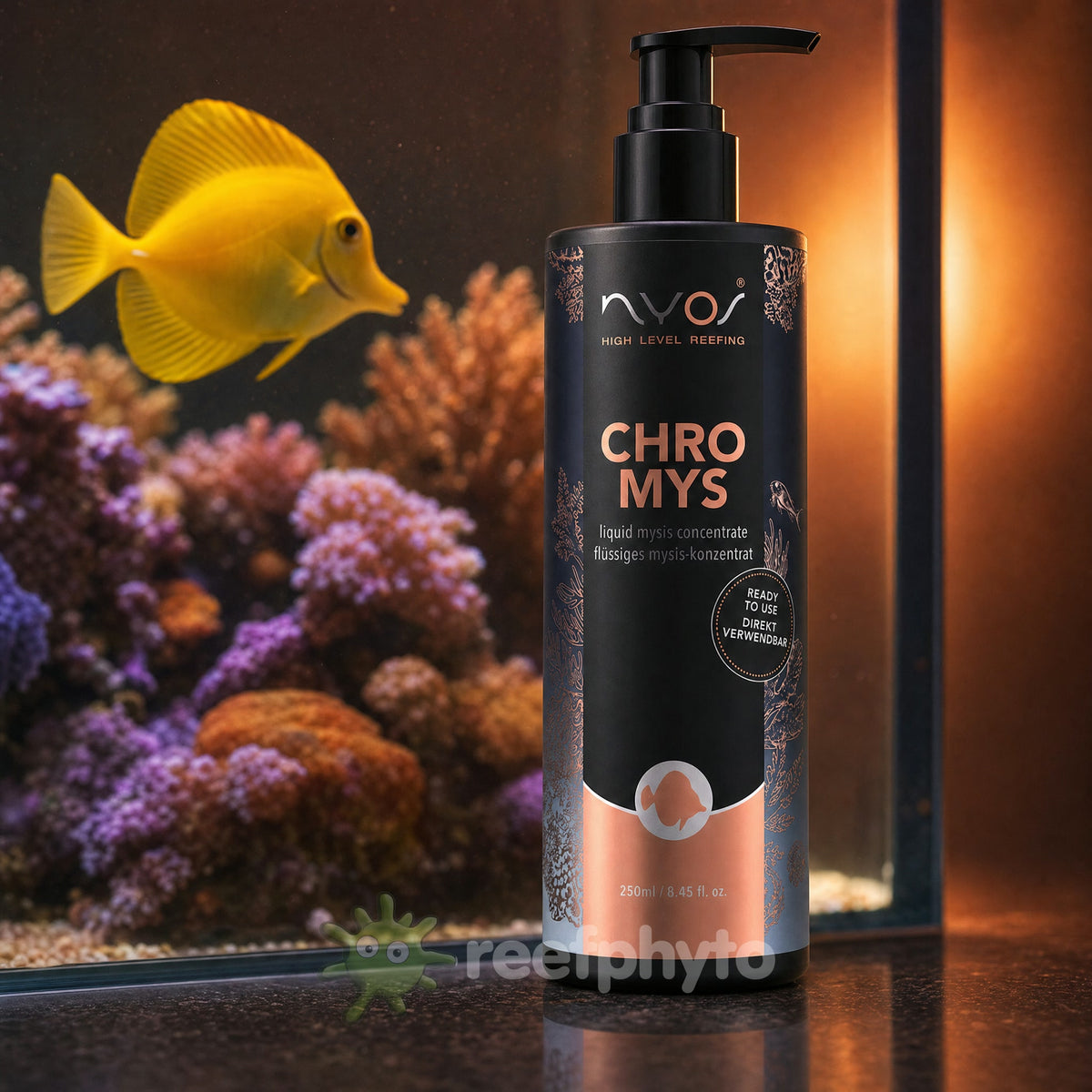 Nyos Chromys liquid mysis food 250ml in front of a reef tank with a yellow tang