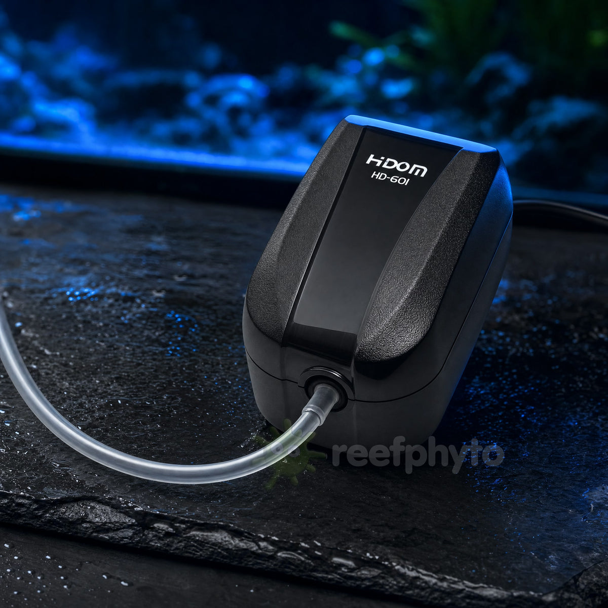 Hidom HD-601 single outlet air pump with airline attached, in front of an aquarium