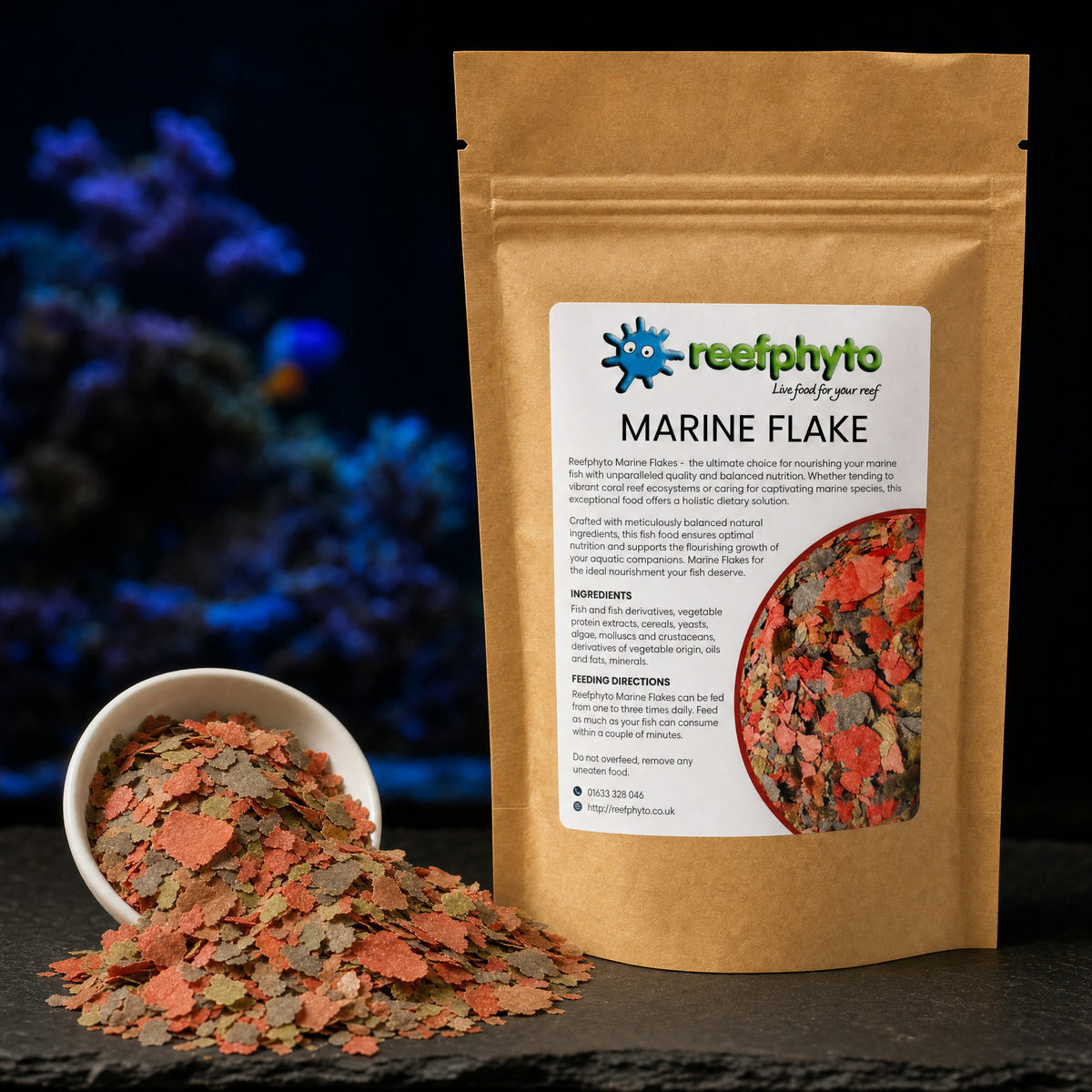Reefphyto Marine Flake mixed red, salmon and green flakes in a white dish beside the pouch