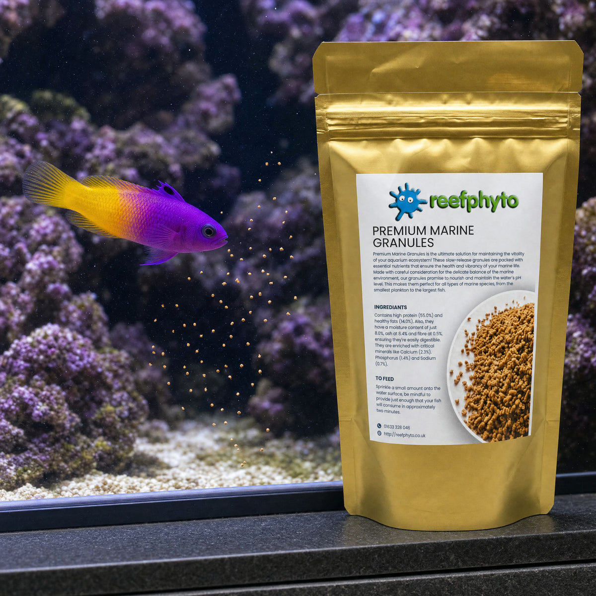 Royal gramma feeding on sinking Reefphyto Premium Marine Granules beside the pouch