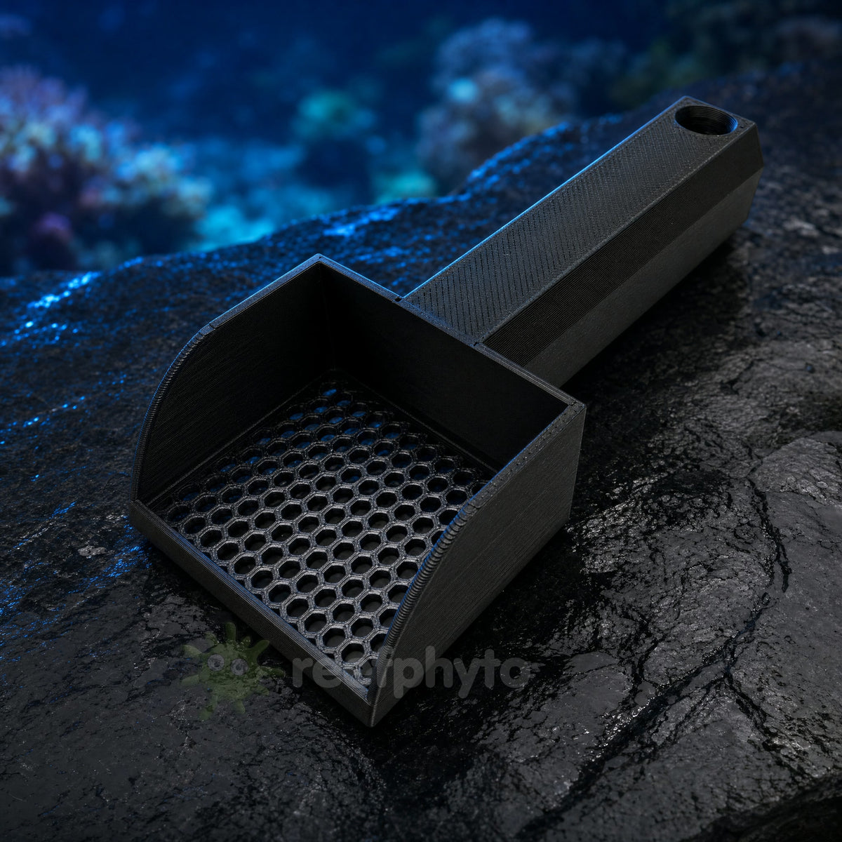 Reefphyto Mini Sand Sieve in black, 3D printed, showing the honeycomb mesh scoop