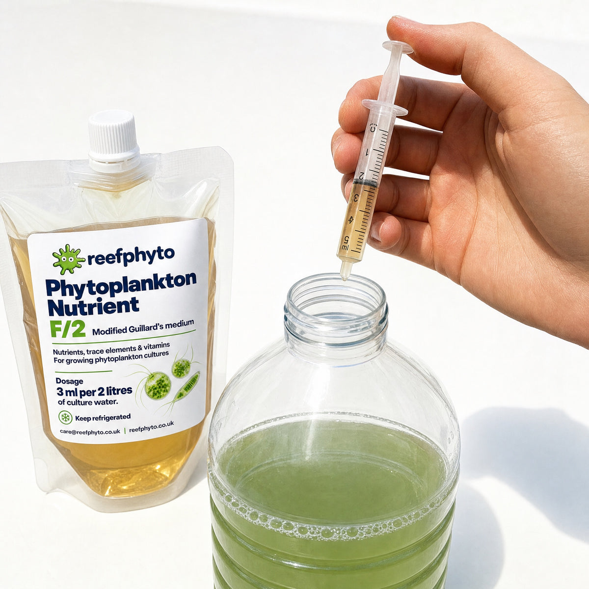 Dosing 3 ml of Reefphyto F/2 Phytoplankton Nutrient into a 2 litre culture bottle
