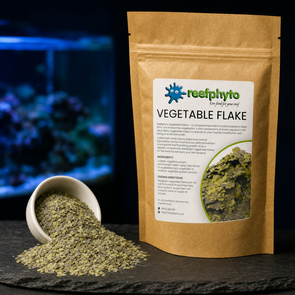 Reefphyto Vegetable Flake green flakes spilling from a white dish beside the pouch